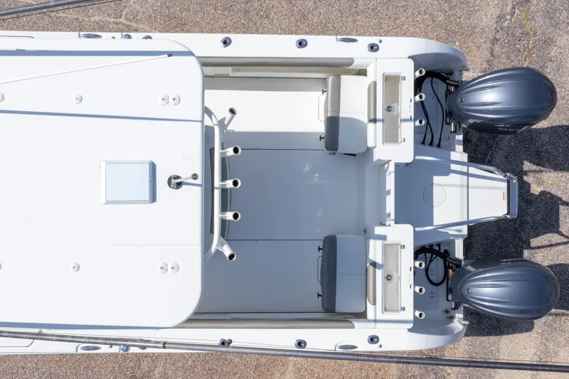 Slide: The Image of Aerial view of 2022 World Cat 325 CC boat with dual engines and spacious deck. - 14
