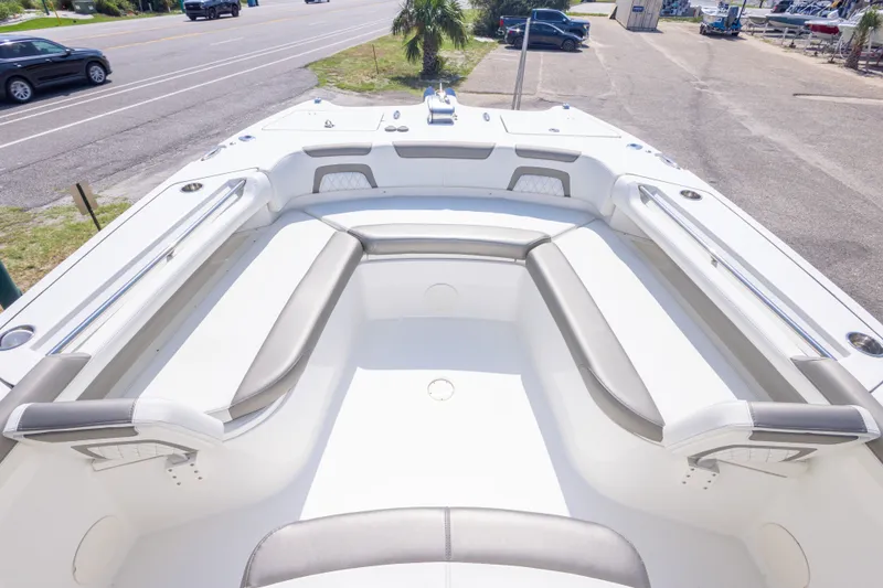 Slide: The Image of 2022 World Cat 325 CC boat interior with spacious seating and sleek design. - 35