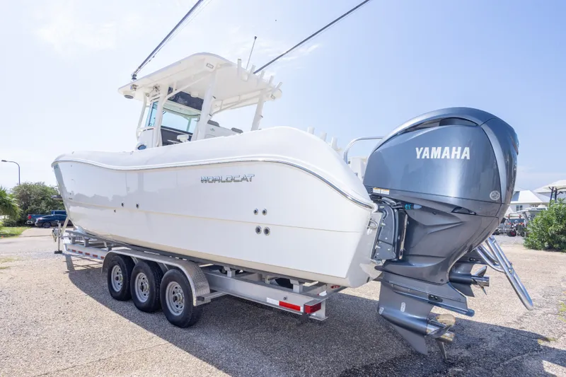 Slide: The Image of 2022 World Cat 325 CC boat with Yamaha engines on a trailer. - 18