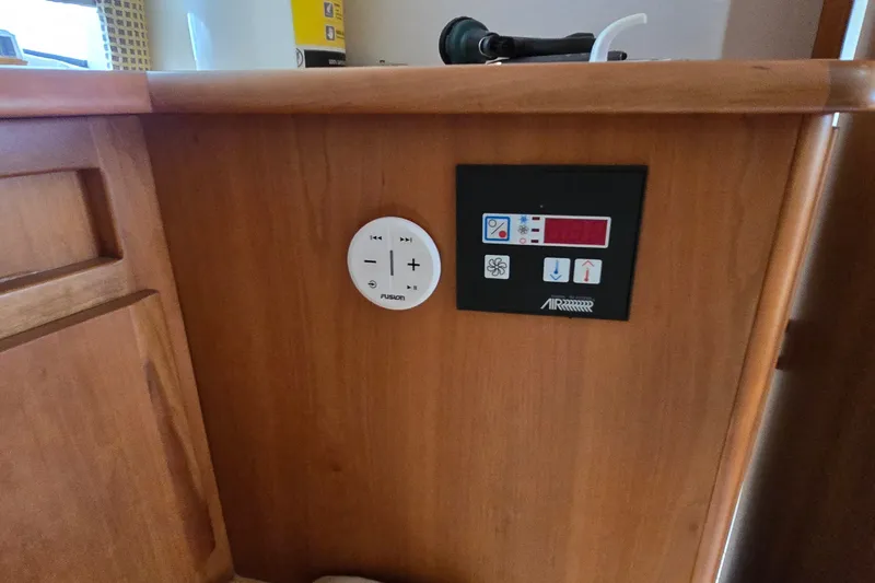 Slide: The Image of Control panel on 2001 Silverton 330 Sport Bridge boat interior. - 28