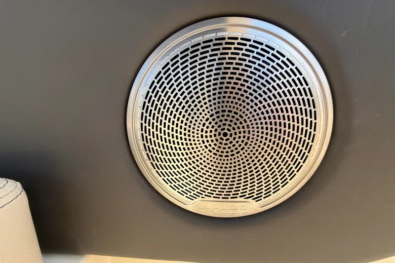 Slide: The Image of Speaker grille on 2027 Chris-Craft Sportster 28 OB boat interior. - 19