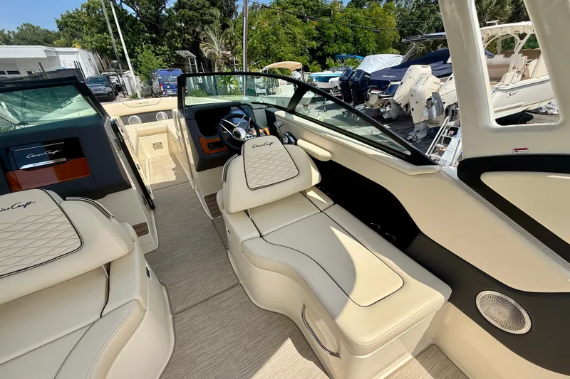 Slide: The Image of 2027 Chris-Craft Sportster 28 OB interior with luxurious seating and modern dashboard design. - 16