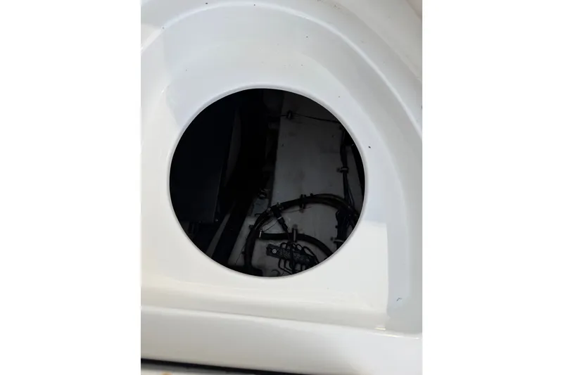 Slide: The Image of Inspection hatch of 2022 Sea Hunt Ultra 275SE boat, showing internal wiring. - 5