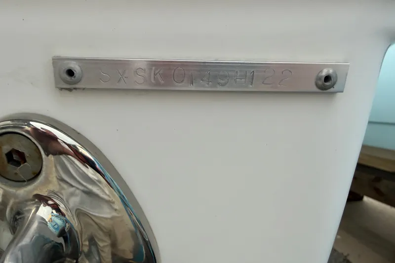 Slide: The Image of 2022 Sea Hunt Ultra 275SE boat identification plate with engraved serial number. - 29
