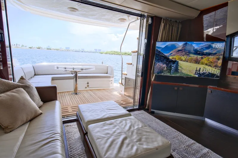 Slide: The Image of Luxurious 2017 Sea Ray L590 Fly yacht interior with scenic view and modern amenities. - 43
