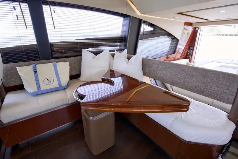 Slide: The Image of Luxurious interior of 2017 Sea Ray L590 Fly yacht with elegant seating and wooden table. - 46