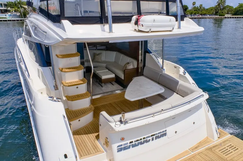 Slide: The Image of Luxurious 2017 Sea Ray L590 Fly yacht with spacious deck and elegant interior. - 8