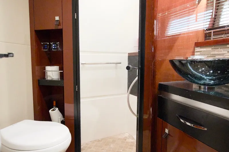 Slide: The Image of Luxurious bathroom in 2017 Sea Ray L590 Fly yacht with modern fixtures and elegant design. - 60