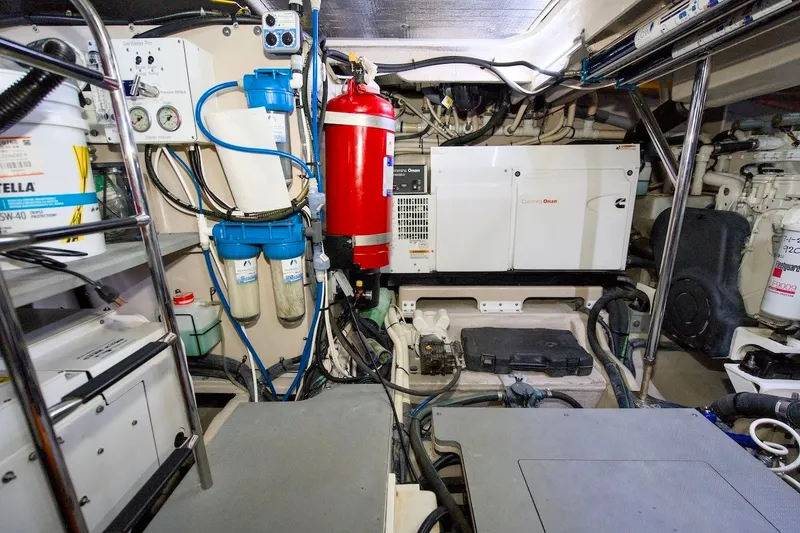 Slide: The Image of Engine room of 2017 Sea Ray L590 Fly yacht with Cummins Onan generator. - 69
