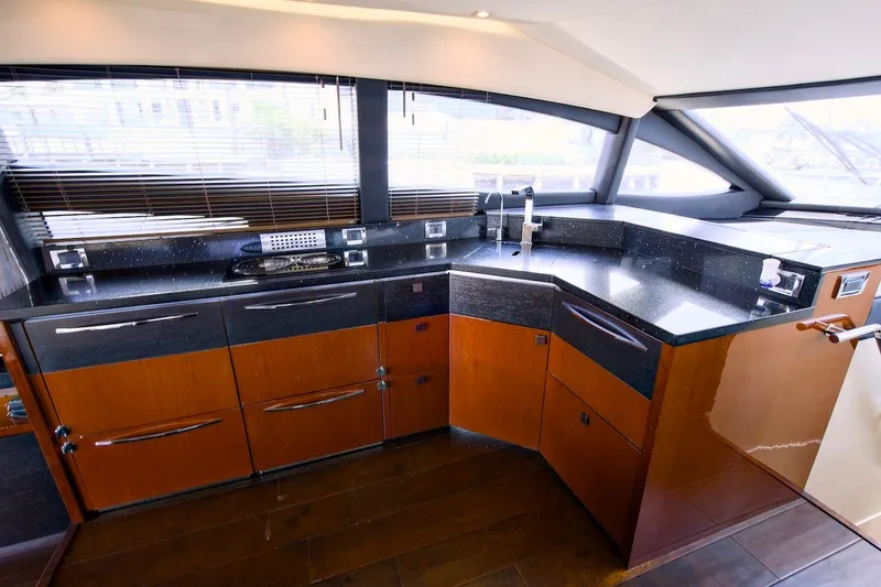 Slide: The Image of Luxurious kitchen interior of 2017 Sea Ray L590 Fly yacht with sleek countertops. - 48