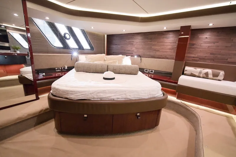 Slide: The Image of Luxurious 2017 Sea Ray L590 Fly yacht bedroom with elegant decor and modern lighting. - 52