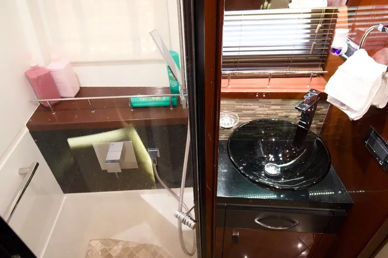 Slide: The Image of Luxurious bathroom interior of 2017 Sea Ray L590 Fly yacht with modern fixtures. - 61