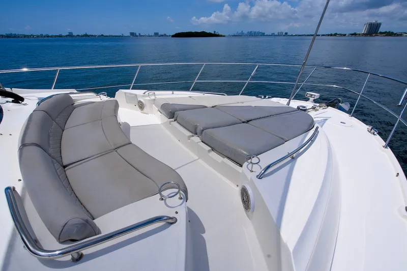 Slide: The Image of Luxurious 2017 Sea Ray L590 Fly yacht with spacious deck and scenic ocean view. - 29