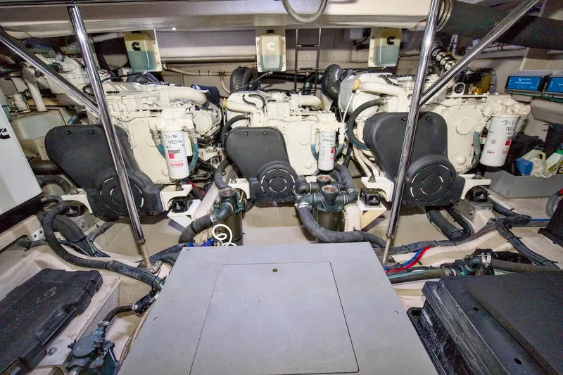 Slide: The Image of Engine room of 2017 Sea Ray L590 Fly yacht with visible machinery and components. - 66