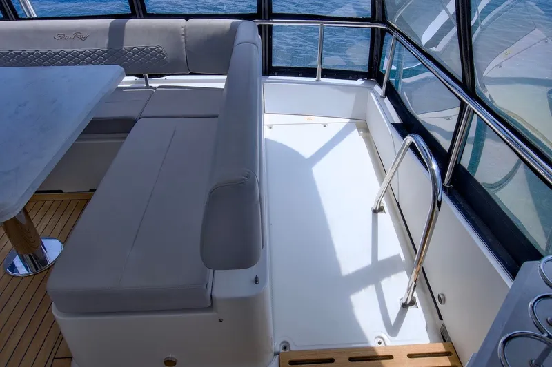 Slide: The Image of Luxurious interior of 2017 Sea Ray L590 Fly yacht with elegant seating and table. - 39