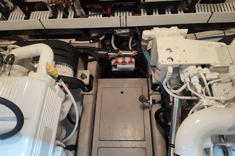 Slide: The Image of Engine room of a 2017 Sea Ray Sundancer 510 yacht, showcasing mechanical components. - 55
