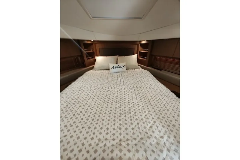 Slide: The Image of Luxurious bedroom interior of 2017 Sea Ray Sundancer 510 yacht with cozy bedding. - 36