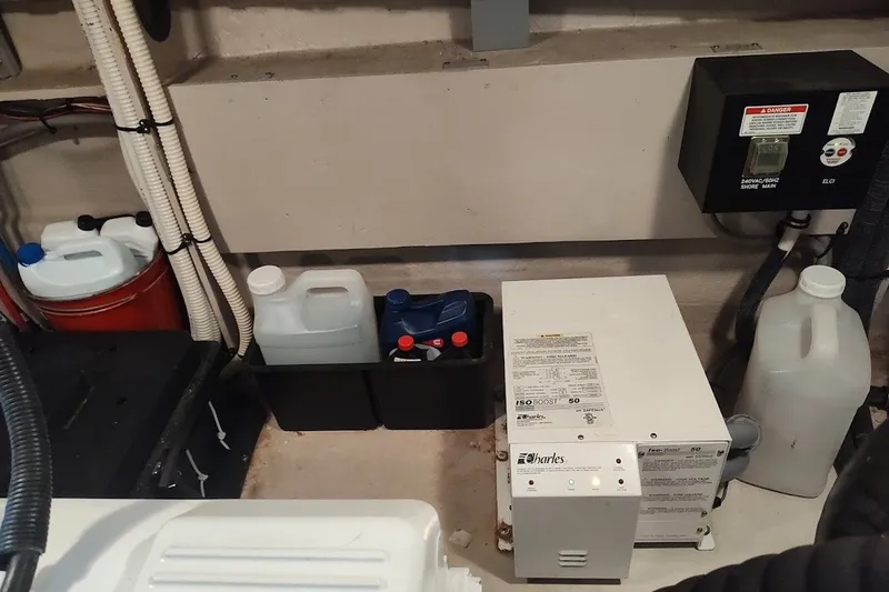 Slide: The Image of Engine room of 2017 Sea Ray Sundancer 510 with various containers and equipment. - 50