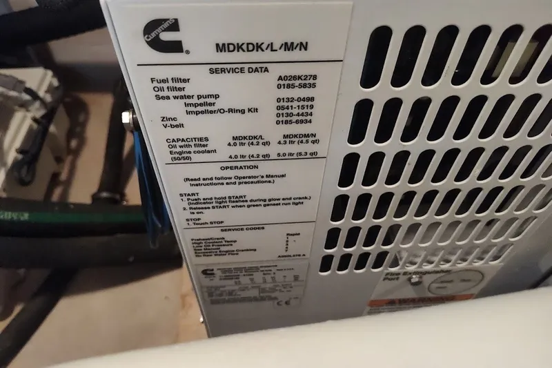 Slide: The Image of Engine service data label on a 2017 Sea Ray Sundancer 510 boat. - 45