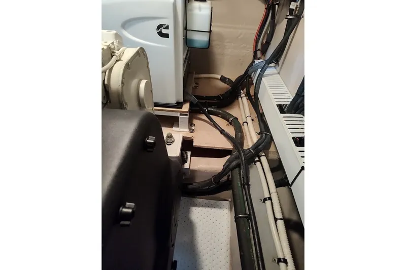 Slide: The Image of Engine room of 2017 Sea Ray Sundancer 510 with Cummins components and wiring. - 48