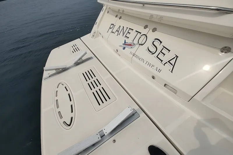 Slide: The Image of 2017 Sea Ray Sundancer 510 yacht with "Plane to Sea" name, docked in Harrison Township, MI. - 38