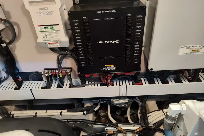 Slide: The Image of Engine room of 2017 Sea Ray Sundancer 510 with electrical panel and wiring. - 49