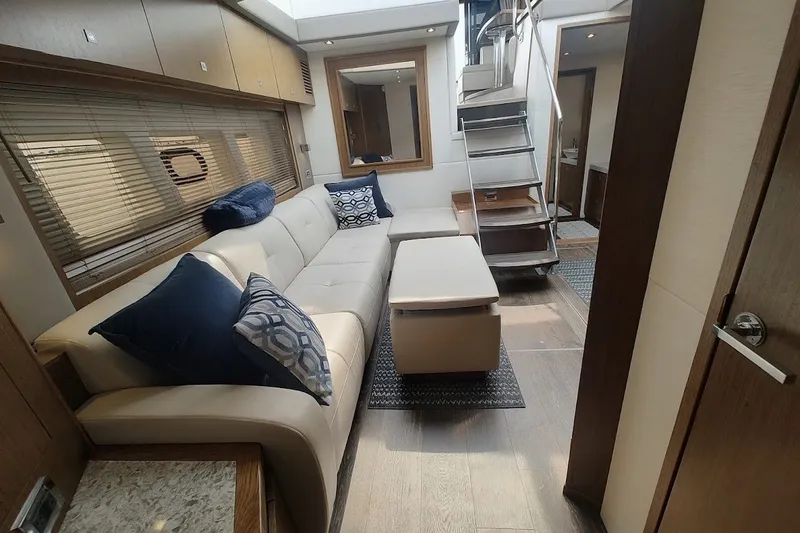 Slide: The Image of Luxurious interior of 2017 Sea Ray Sundancer 510 yacht with modern seating and elegant decor. - 23