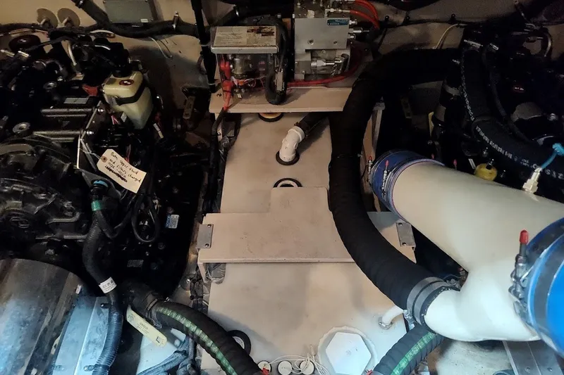 Slide: The Image of Engine room of a 2017 Sea Ray Sundancer 510 yacht, showcasing mechanical components. - 51