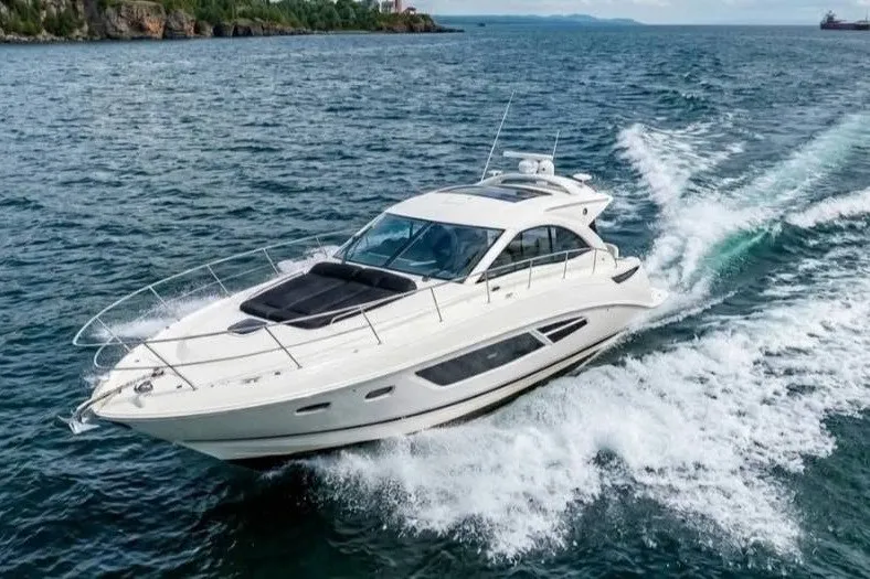 Slide: The Image of 2017 Sea Ray Sundancer 510 cruising on open water, showcasing sleek design and performance. - 4