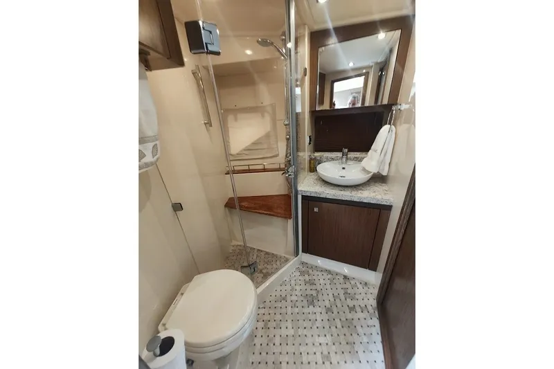 Slide: The Image of Luxurious bathroom in 2017 Sea Ray Sundancer 510 yacht with modern fixtures and elegant design. - 32