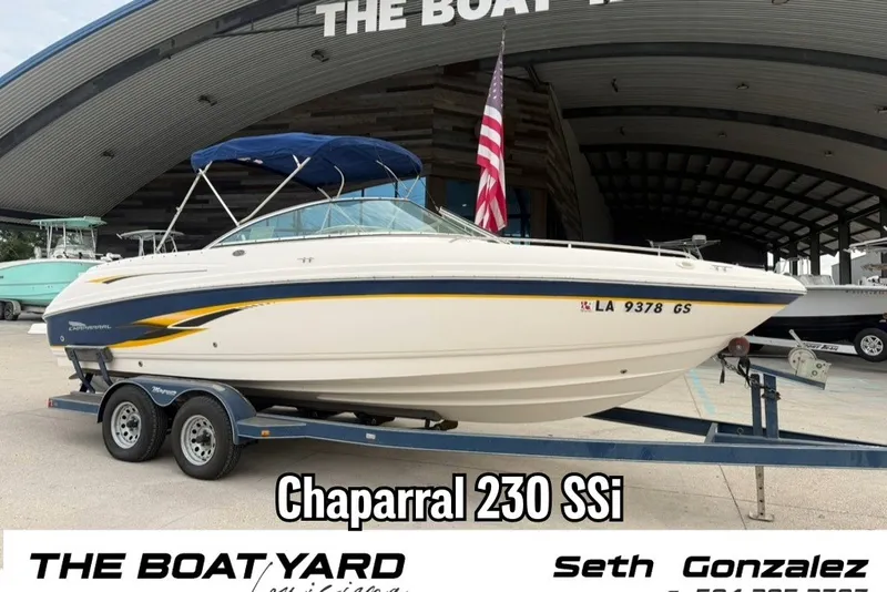 The Image of 2001 Chaparral 230 SSi boat on trailer, displayed at The Boat Yard. - 1