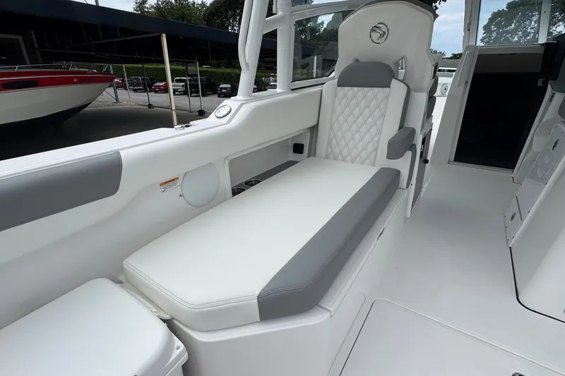Slide: The Image of Interior seating of a 2027 Edgewater 310SC boat, featuring modern design and comfort. - 26