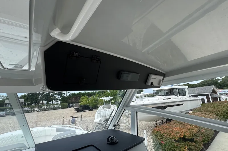 Slide: The Image of Interior view of 2027 Edgewater 310SC boat with navigation equipment. - 31