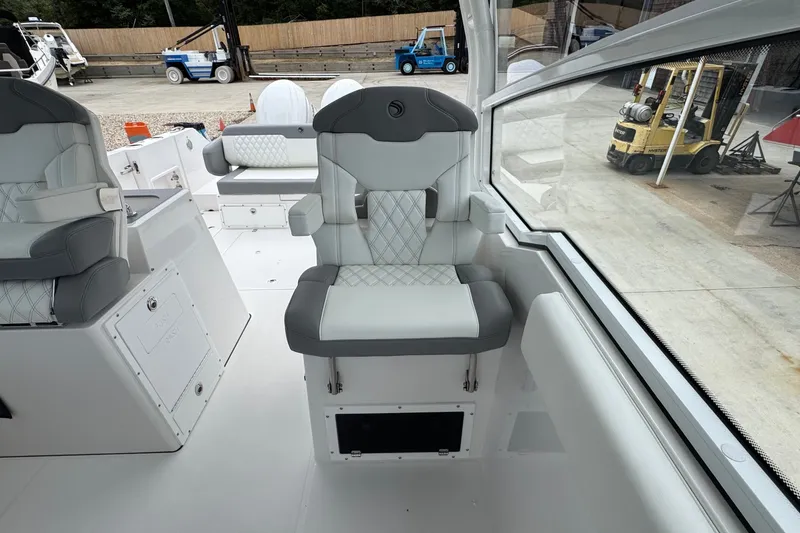 Slide: The Image of Luxury seating on 2027 Edgewater 310SC boat, featuring modern design and comfort. - 34