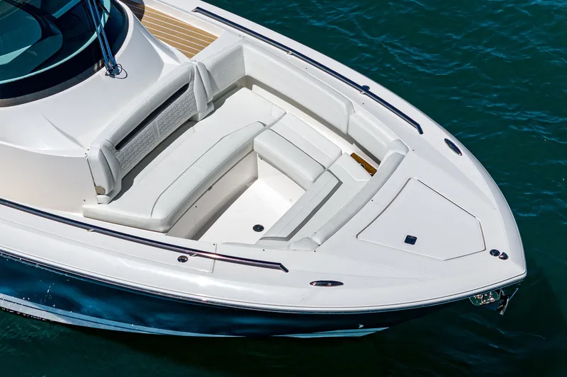 Slide: The Image of The 2024 Tiara Yachts 38 LS features a sleek design with comfortable seating in the bow area. - 15