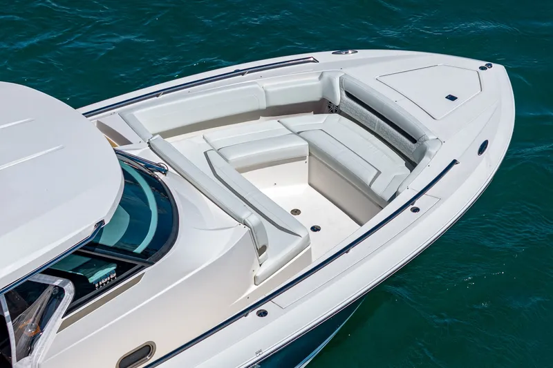 Slide: The Image of The 2024 Tiara Yachts 38 LS features a sleek, modern design with a spacious bow area. - 13