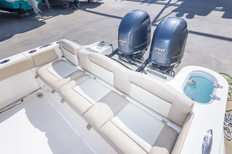 Slide: The Image of 2017 NauticStar 2602 Legacy boat with dual Yamaha 150 engines and spacious seating. - 41
