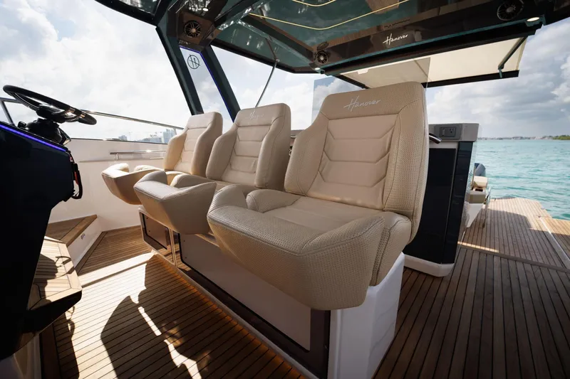 Slide: The Image of Luxurious seating on 2026 Hanover 447 yacht with scenic ocean view. - 34