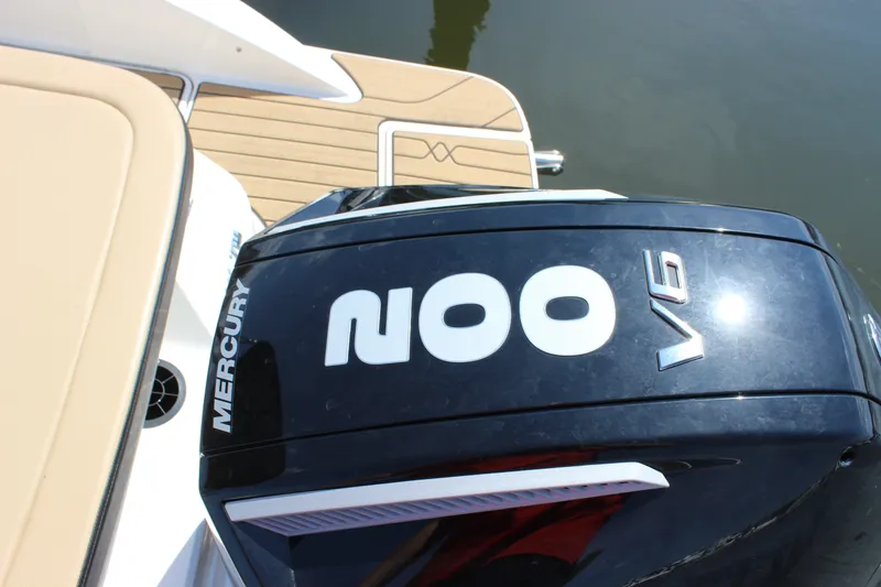 Slide: The Image of 2025 Sea Ray SPX 210 Outboard with Mercury 200 V6 engine on water. - 9