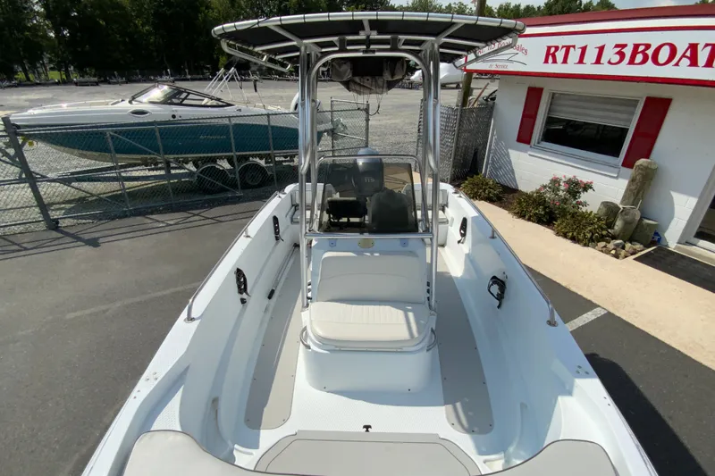 Slide: The Image of 2004 Triumph 190 Bay boat with T-top, parked near RT113 Boat Sales. - 17