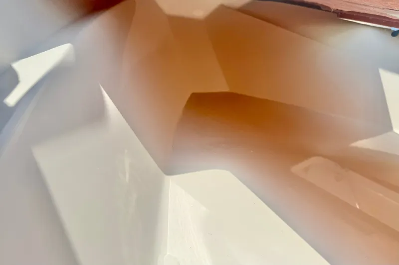 Slide: The Image of Abstract view of a Carolina Skiff 26 Ultra Elite boat interior, 2027 model. - 17