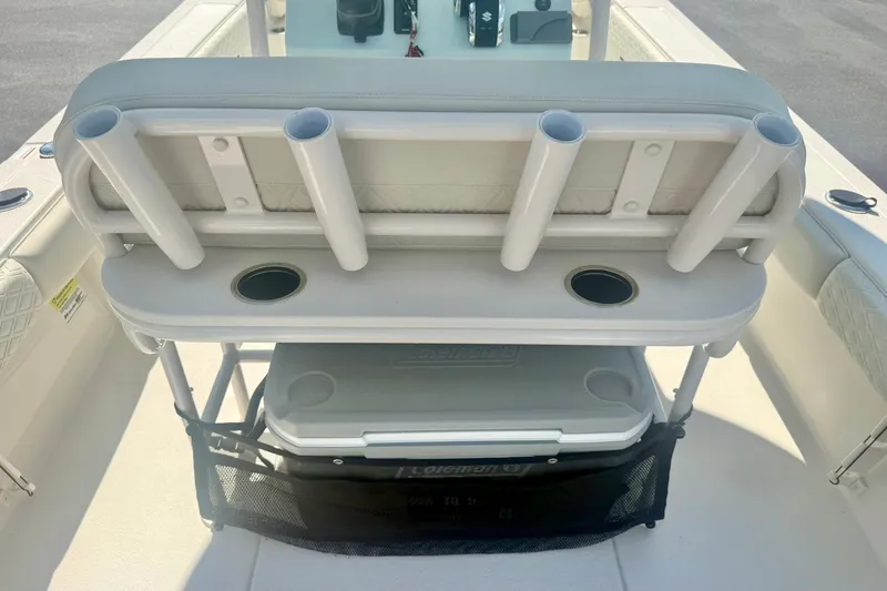 Slide: The Image of 2027 Carolina Skiff 26 Ultra Elite boat seating with rod holders and storage. - 27