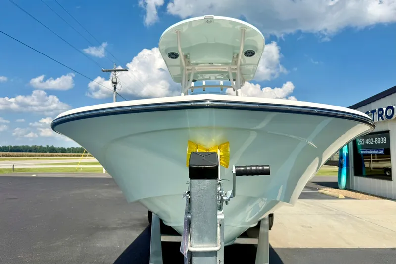 Slide: The Image of 2027 Carolina Skiff 26 Ultra Elite boat on trailer, clear sky background. - 8