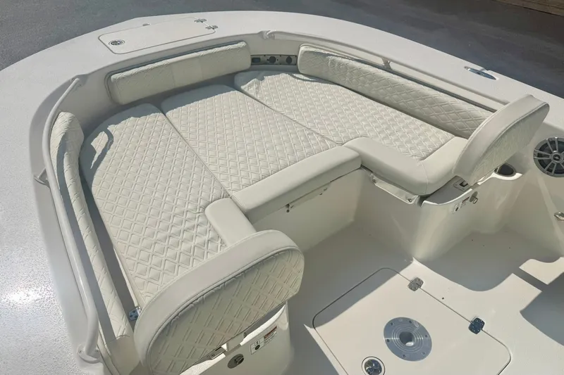 Slide: The Image of Luxurious seating on 2027 Carolina Skiff 26 Ultra Elite boat, featuring diamond-stitched upholstery. - 10