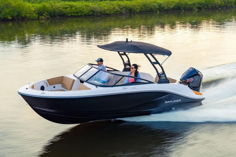 The Image of Manufacturer Provided Image: 2025 Bayliner V20 boat cruising on calm water with two passengers. - 0