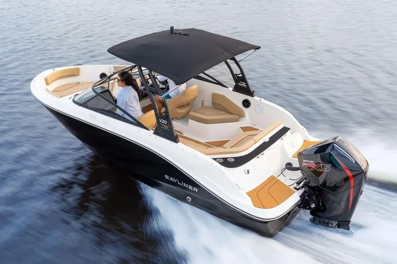 Slide: The Image of Manufacturer Provided Image: 2025 Bayliner V20 boat cruising on water, featuring sleek design and powerful Mercury engine. - 2