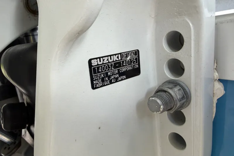 Slide: The Image of Suzuki motor label on 2012 Hurricane Center Console 231 OB boat engine mount. - 20