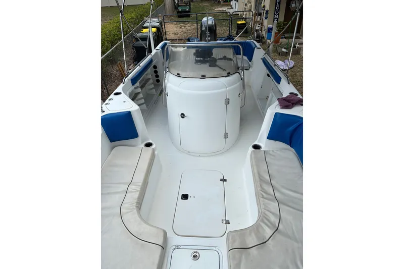 Slide: The Image of 2012 Hurricane Center Console 231 OB boat interior with seating and console. - 5