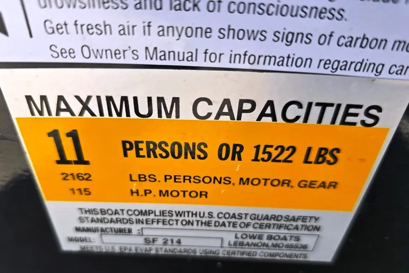 Slide: The Image of Maximum capacity label for 2013 Lowe SF 214 Sport Fish boat: 11 persons or 1522 lbs. - 17