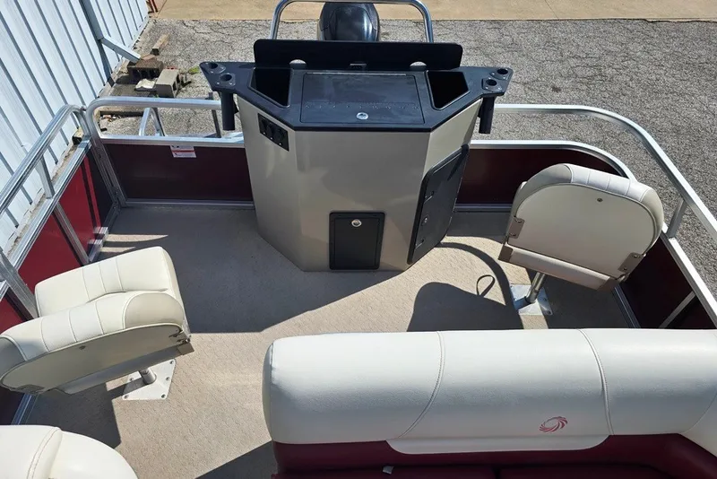 Slide: The Image of 2013 Lowe SF 214 Sport Fish boat interior with seating and control console. - 7